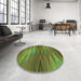 Round Patterned Antique Bronze Green Rug in a Office, pat2945grn