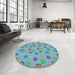 Round Patterned Medium Turquoise Green Rug in a Office, pat2969lblu