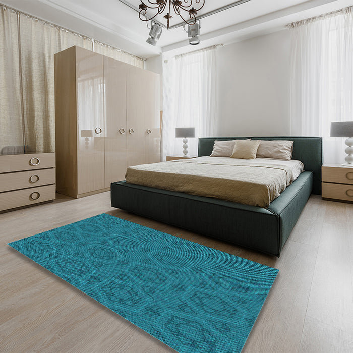 Patterned Dark Turquoise Green Rug in a Bedroom, pat2986lblu