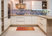 Patterned Neon Orange Rug in a Kitchen, pat3014org