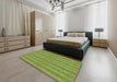 Patterned Green Novelty Rug in a Bedroom, pat3059