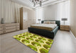 Patterned Dark Yellow Green Rug in a Bedroom, pat3087yw