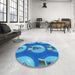 Round Patterned Blue Rug in a Office, pat3095lblu