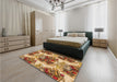 Patterned Yellow Orange Rug in a Bedroom, pat3109org