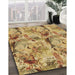 Patterned Saffron Yellow Rug in Family Room, pat3129brn