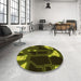 Round Patterned Dark Yellow Green Rug in a Office, pat3164yw