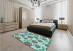 Patterned Aquamarine Green Rug in a Bedroom, pat3221lblu