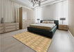 Patterned Yellow Orange Rug in a Bedroom, pat3254brn