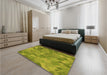 Patterned Green Rug in a Bedroom, pat3282org