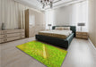 Patterned Dark Yellow Green Rug in a Bedroom, pat3299yw