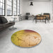 Round Patterned Yellow Rug in a Office, pat3307org