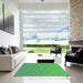 Square Patterned Green Rug in a Living Room, pat3376grn
