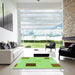 Square Patterned Green Rug in a Living Room, pat3409grn