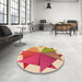 Round Patterned Red Rug in a Office, pat3458org