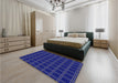 Patterned Earth Blue Rug in a Bedroom, pat349blu