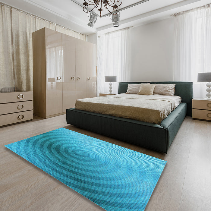 Patterned Dark Turquoise Green Rug in a Bedroom, pat3518lblu