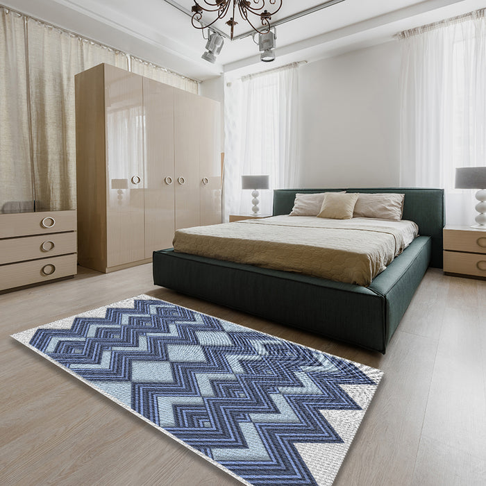 Patterned Blue Novelty Rug in a Bedroom, pat3536