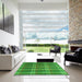 Square Patterned Green Rug in a Living Room, pat3550grn