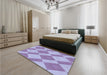 Patterned Medium Purple Rug in a Bedroom, pat3561blu