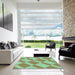 Square Patterned Green Rug in a Living Room, pat3561lblu