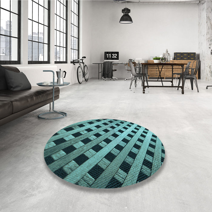 Round Patterned Medium Turquoise Green Rug in a Office, pat3586lblu