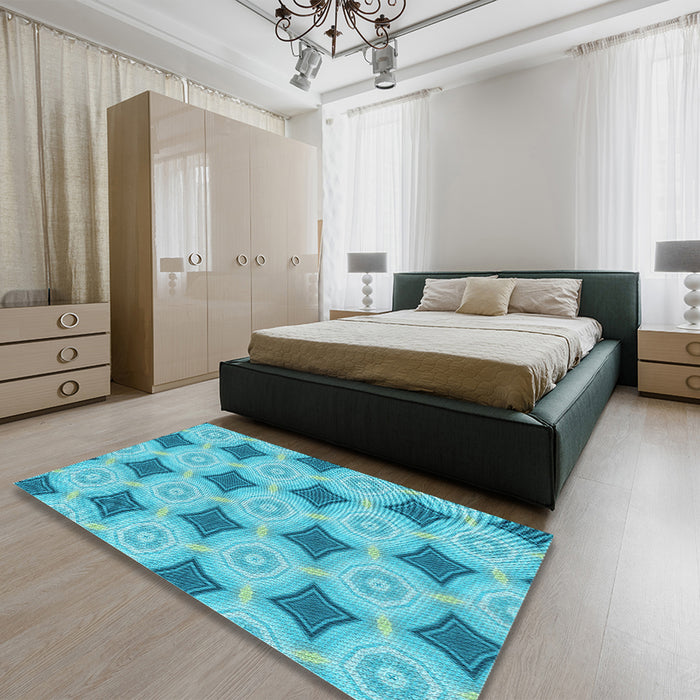 Patterned Dark Turquoise Green Rug in a Bedroom, pat3594lblu