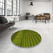 Round Patterned Dark Yellow Green Rug in a Office, pat3633yw