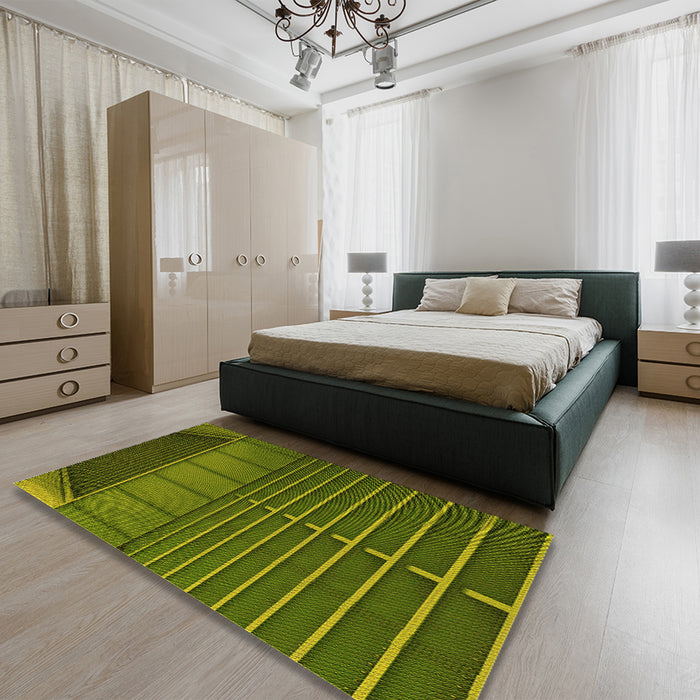 Patterned Dark Yellow Green Rug in a Bedroom, pat3633yw