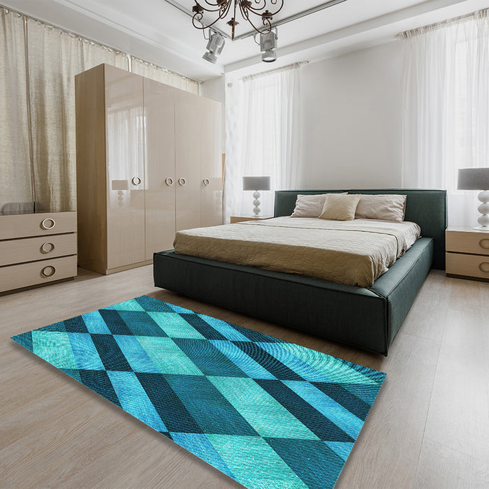 Patterned Teal Green Rug in a Bedroom, pat3637lblu