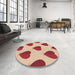 Round Patterned Red Rug in a Office, pat3652brn