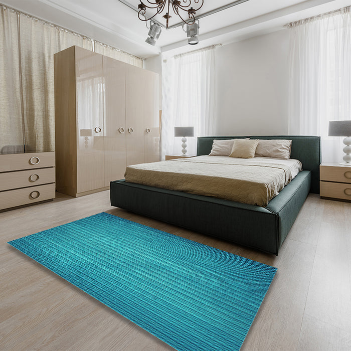 Patterned Dark Cyan Green Rug in a Bedroom, pat366lblu