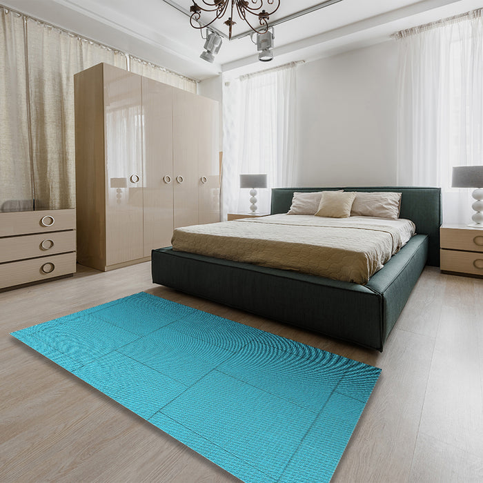 Patterned Dark Cyan Green Rug in a Bedroom, pat3665lblu