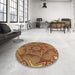 Round Patterned Saffron Red Rug in a Office, pat3714brn