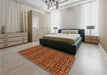 Patterned Neon Orange Rug in a Bedroom, pat3731org