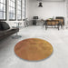 Round Patterned Orange Rug in a Office, pat3743brn