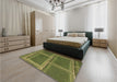 Patterned Dark Yellow Green Rug in a Bedroom, pat3756brn