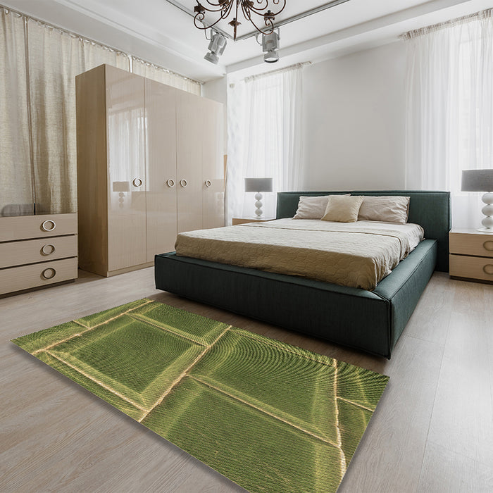Patterned Dark Yellow Green Rug in a Bedroom, pat3756brn