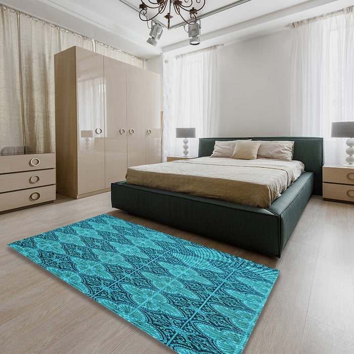 Patterned Dark Cyan Green Rug in a Bedroom, pat3757lblu