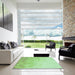 Square Patterned Green Rug in a Living Room, pat3805grn