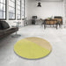 Round Patterned Bold Yellow Rug in a Office, pat3831brn