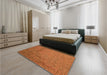 Patterned Neon Orange Rug in a Bedroom, pat3858org