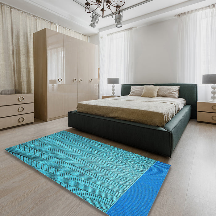 Patterned Dark Cyan Green Rug in a Bedroom, pat3863lblu