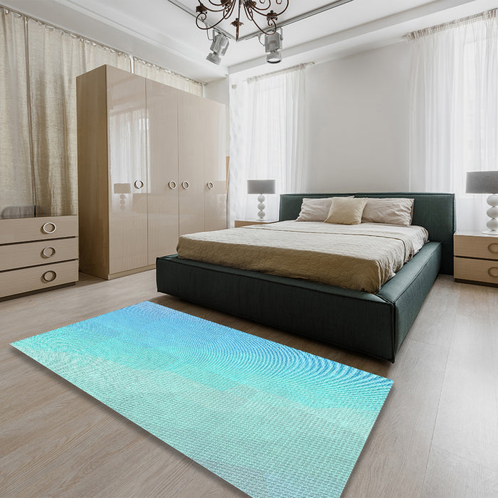 Patterned Blue Turquoise Green Rug in a Bedroom, pat3901lblu