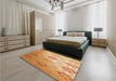 Patterned Yellow Orange Rug in a Bedroom, pat3903org