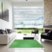 Square Patterned Green Rug in a Living Room, pat3910grn