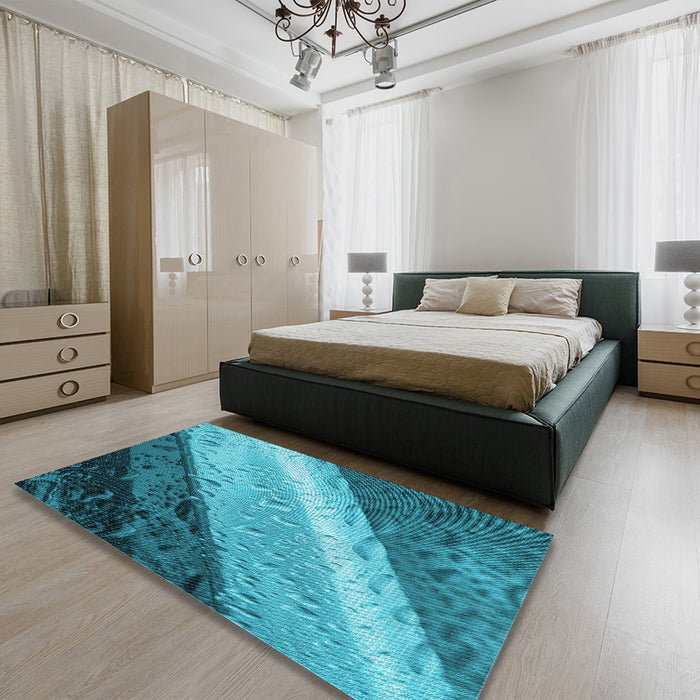 Patterned Teal Green Rug in a Bedroom, pat3911lblu