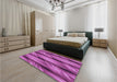 Patterned Medium Violet Red Pink Rug in a Bedroom, pat3929pur