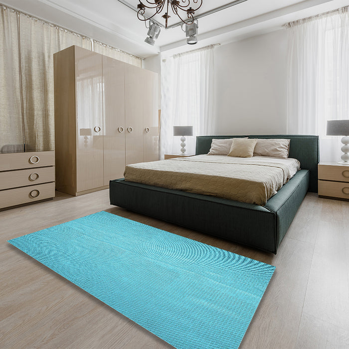 Patterned Bright Cyan Blue Rug in a Bedroom, pat3932lblu