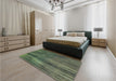 Patterned Army Green Rug in a Bedroom, pat3957lblu