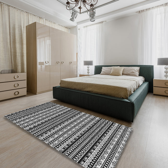 Patterned Mid Gray Novelty Rug in a Bedroom, pat3977